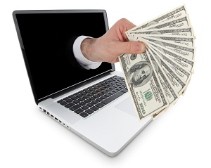 isolated modern laptop with hand and dollar money